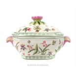 A Continental crackle glazed porcelain tureen, hand painted with floral designs