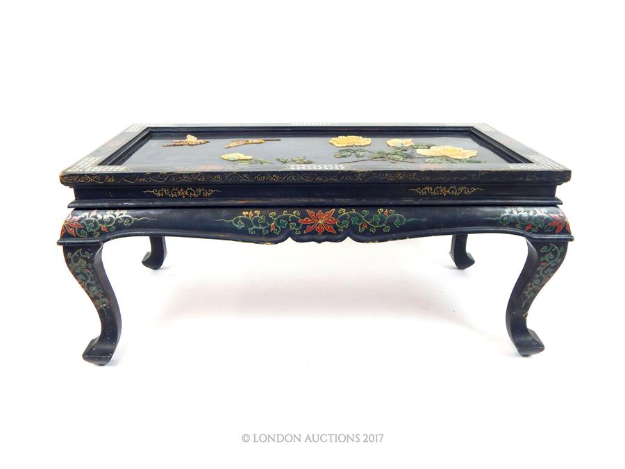 A 20th century Chinese black lacquered, painted and gilded low table, the top inlaid with mother of - Image 2 of 4