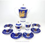 An Egyptian 'Fine Regal Porcelain' coffee set to seat six, decorated with ancient Egyptian figures