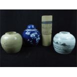 A blue and ginger white ginger jar with lid (21cm high) together with three 20th century art pottery