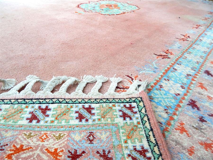 A Moroccan carpet, the green medallion on a pink field - Image 3 of 3