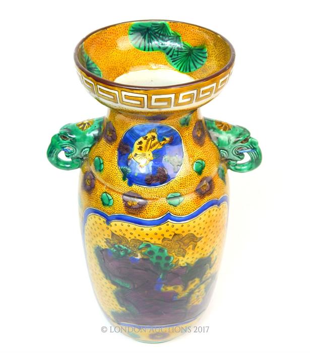 An eastern twin, elephant headed, handled vase with a depiction of a leopard and tiger, yellow - Image 2 of 3