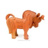 A large Asian terracotta standing bull; 62cm long.