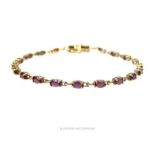 9 ct yellow gold, amethyst link bracelet