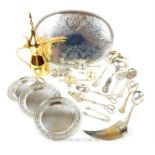 A collection of silver plated items including an oval tray with a gallery edge