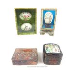 Three Chinese hand painted eggs contained in two display cases and other items