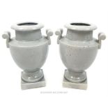 A pair of ceramic vases of Classical form with crackle grey glaze