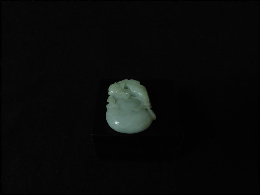 A finely carved Chinese jade pendant