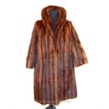A vintage, ladies, brown fur coat