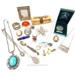 A collection of silver and costume jewellery including cameo brooches, pewter items and a bone box