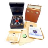 A Vintage, cased, wind-up record player by His Master's Voice with a quantity of records