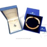 A Swarovski crystal boxed necklace and bracelet