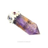 A large, striking, sterling silver pendant set with a natural ametrine crystal and six sapphires