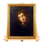 A 17th /18th century oil on canvas laid to panel, portrait of a saint