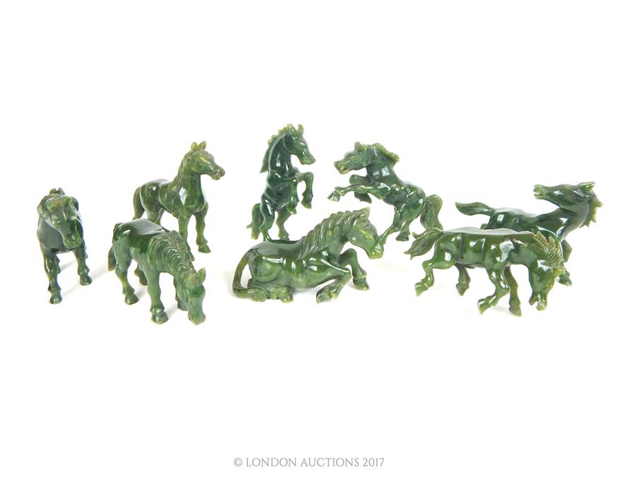 Eight, early 20th century, Chinese, finely-carved, spinach jade (lucky) horses