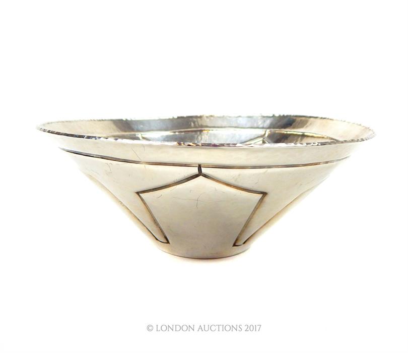 An Arts and Crafts style hallmarked sterling silver bowl, assayed in Sheffield in 1996
