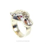 A unique, sterling silver, handmade leopard's head ring with ruby-set eyes