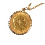 A 1907 gold half sovereign in a 9ct gold mount on a 9ct gold chain, 8.7g gross.