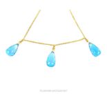 An 18 ct yellow gold, blue topaz and diamond drop necklace