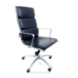 An Italian Eames style chromed office chair, having black leather cushions