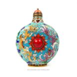 A Chinese cloisonne snuff bottle, set with red hard stone cabochons to the lid and sides