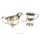 A hallmarked sterling silver sauce boat, together with a hallmarked sterling silver tankard