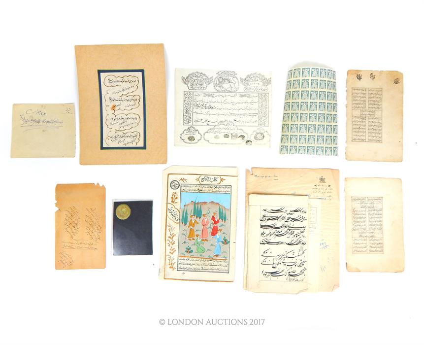 A collection of thirteen pieces of 19th century Persian Qujar period ephemera, including an unused