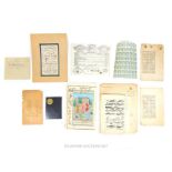 A collection of thirteen pieces of 19th century Persian Qujar period ephemera, including an unused