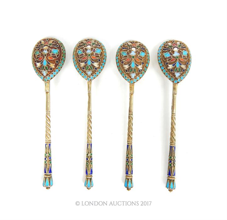 A set of four early 20th century pre-revolution Russian silver gilt and cloisonne enamel teaspoons