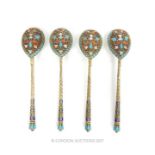 A set of four early 20th century pre-revolution Russian silver gilt and cloisonne enamel teaspoons