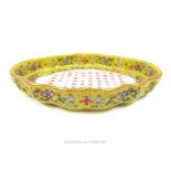 A Chinese porcelain cartouche form dish, hand painted with Chinese characters