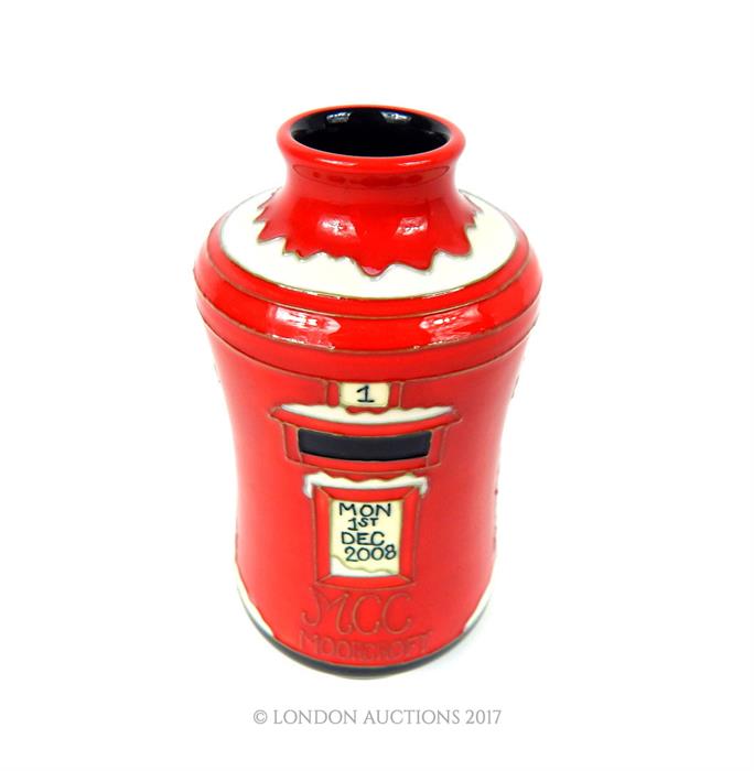 A Moorcroft Collector's Club vase in the form of a post box in the snow,