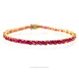 Tested as 14 ct yellow gold, natural, (treated), ruby tennis bracelet