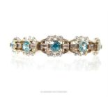 A stunning, 9 ct yellow gold, Art Deco, aquamarine and white sapphire bracelet