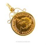 A 1907, Peruvian, half guinea in an 18 ct yellow gold mount