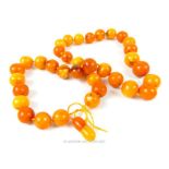 An impressive, large, Baltic amber rounded-bead necklace