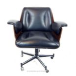 A Probjeto designer flexform leather upholstered chair, designer name indistinct on label; raised