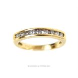 A, boxed, 18 ct yellow gold ring set with nine, round, brilliant-cut diamonds