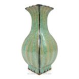 A Chinese square based vase with translucent crackle glaze and four character mark to its base; 22.