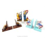 Three pairs of novelty bookends, including two Curious George examples
