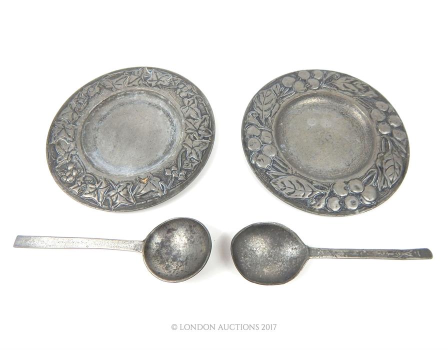 Two Arts and Crafts handmade pewter dishes with handmade pewter spoons