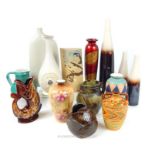 A collection of various ceramic vases and jugs, including a hand painted Jeff Banks 'Ports of Call'