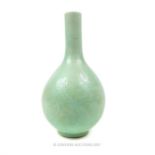 A Chinese celadon glazed vase, having a slender neck and bulbous body