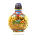 A Peking glass snuff bottle with hand painted grasshopper also with a four character mark to its