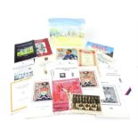 A collection of mostly cricket related ephemera; featuring a postcard with the Australian team of