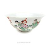 A Chinese famille vert bowl, its exterior with depictions of various figures; 26cm diameter.