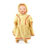 A vintage Armand Marseilles doll with bisque head, sleepy eyes and open mouth; composite hands and