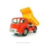 A Corgi Toys die-cast model 494, of a Bedford Tipper Truck in red and yellow with original box (with