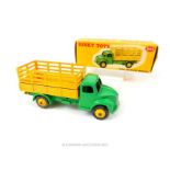 A Dinky Toys die-cast model Dodge Farm Produce Truck "343" in Green and yellow; with box.