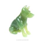 A 20th century, carved, green jade, dog figurine